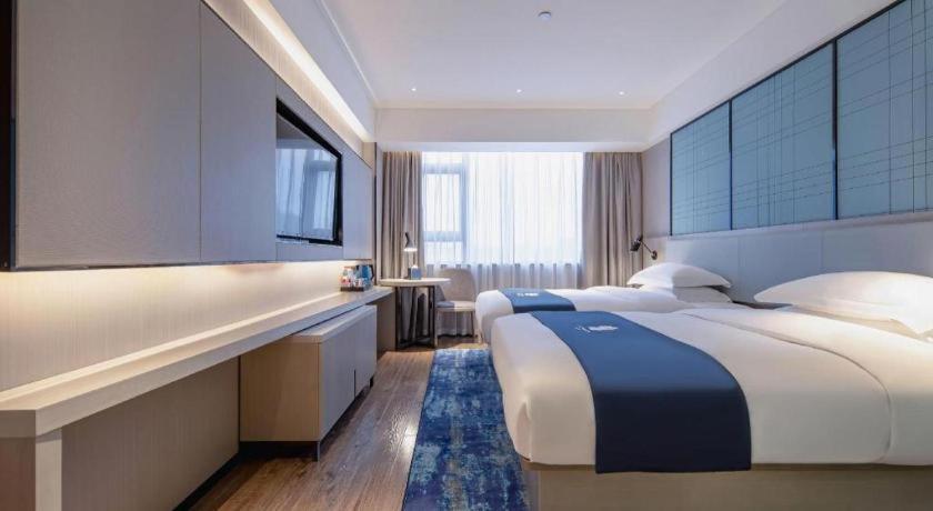 Echarm Hotel Wuzhou Wangcheng Plaza Longmumiao Sanzongfu エクステリア 写真